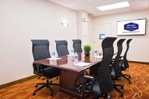 a conference room with a table and chairs at Hampton Inn & Suites Blairsville in Blairsville