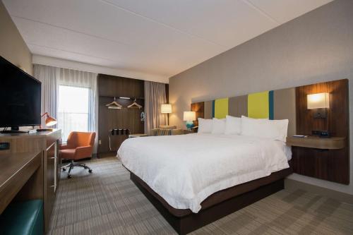 Ένα ή περισσότερα κρεβάτια σε δωμάτιο στο Hampton Inn Brevard