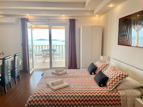 Postel nebo postele na pokoji v ubytování Apartments Marnic