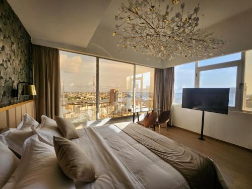 Ein Bett oder Betten in einem Zimmer der Unterkunft Appartements Lamblin