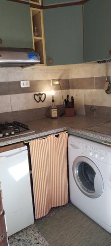 Cucina o angolo cottura di La Casa del Nonno - Tiny House
