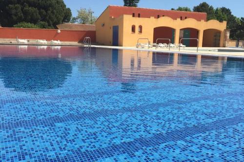 Kolam renang di atau dekat dengan Maisonnette bleu Céleste