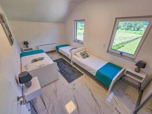 Postel nebo postele na pokoji v ubytování Villa UNA LUX
