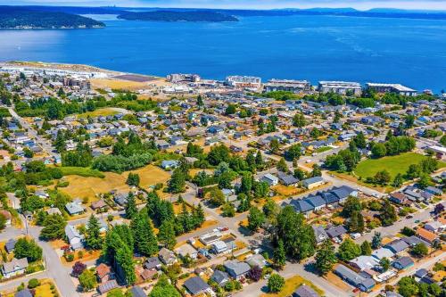 an aerial view of a park with houses and the water at Bodur's Nest Whispering Garden in Tacoma