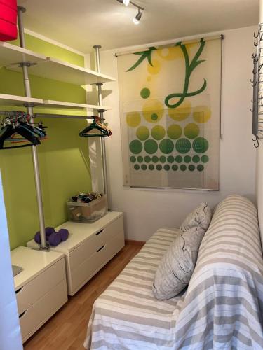 En eller flere senge i et værelse på Mercado y playa