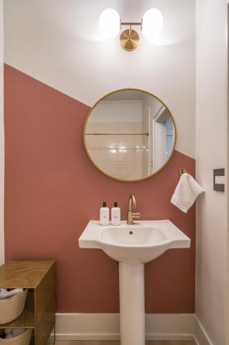 a bathroom with a sink and a mirror at The 505 Eugene in Eugene