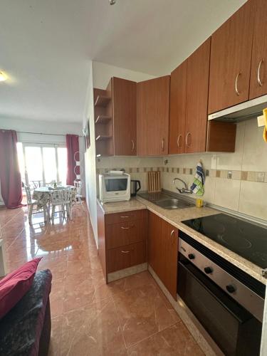 A kitchen or kitchenette at Tenerife Island Oasis Apartment