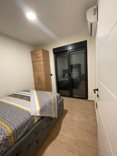 Postel nebo postele na pokoji v ubytování Apartment Maria