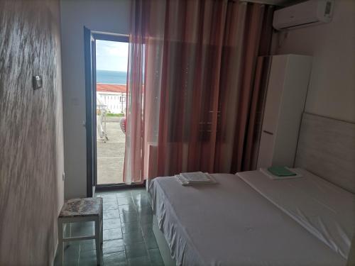 Postel nebo postele na pokoji v ubytování Apartments Stevanovic