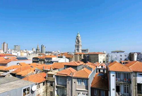 a view of a city with red roofs at Oporto Blue Liberdade - Citycenter View Penthouse Studio in Porto