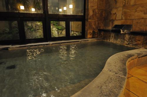 Bazén v ubytování Hakuba Onsen Ryokan Shirouma-so nebo v jeho okolí
