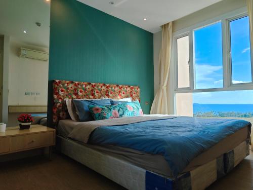 Postel nebo postele na pokoji v ubytování Grande Caribbean Sea View Central