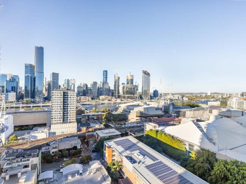 an aerial view of a city with tall buildings at Explore BNE from our Cute 1-Bed Apartment in South Brisbane in Brisbane