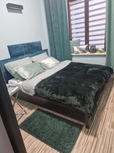Ліжко або ліжка в номері Apartament Blisko Natury