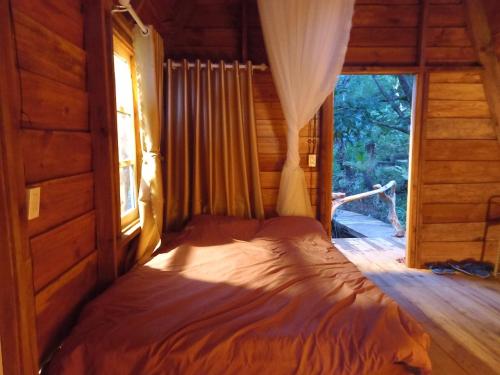 Ένα ή περισσότερα κρεβάτια σε δωμάτιο στο Homestay Da Blah