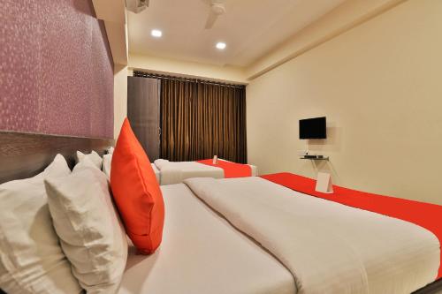 Ein Bett oder Betten in einem Zimmer der Unterkunft Hotel Royal Rituals