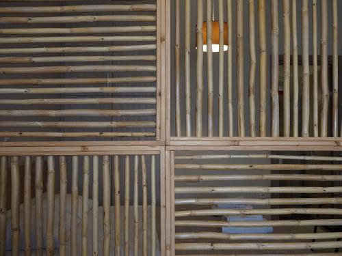 a wall of corrugated metal at Melissinos Beachfront Apartments in Kómi