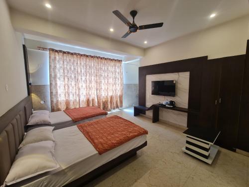 Postel nebo postele na pokoji v ubytování The Nalanda Heritage
