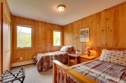 A seating area at Riverfront Vermont Vacation Rental with Hot Tub