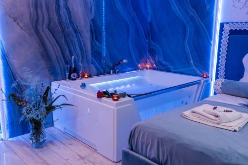 Un ou plusieurs lits dans un hébergement de l'établissement Stacja Galicja Rooms blisko Energylandia