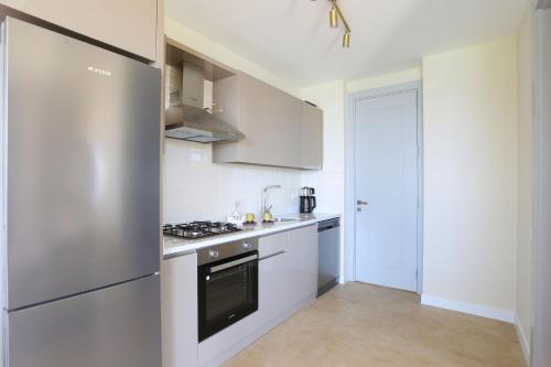 Dapur atau dapur kecil di Kaktus Suites