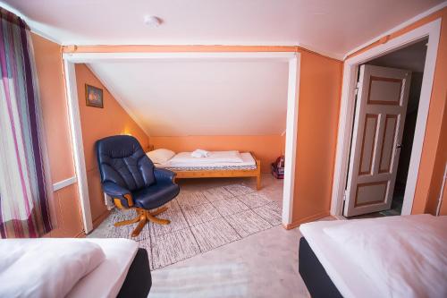 Postel nebo postele na pokoji v ubytování Sjølund house