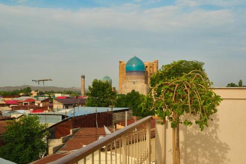 a view of a mosque from a balcony at Kosh Havuz boutique hotel in Samarkand