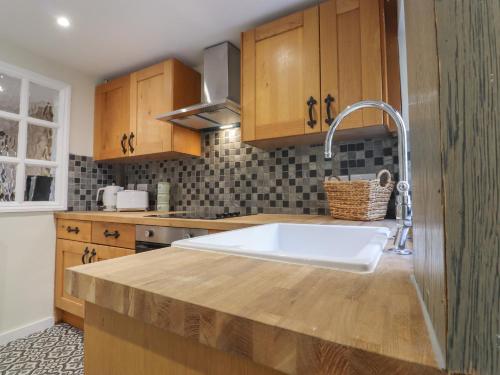 Kuchyň nebo kuchyňský kout v ubytování Star Cottage