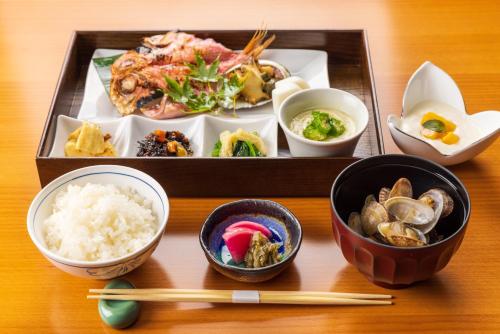 a tray of food with rice and other dishes at Hakone Nanase formerly known as Manatei Hakone in Hakone