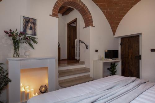 TV a/nebo společenská místnost v ubytování DormiVeglia B&B