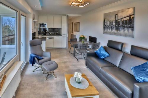Posezení v ubytování Terrassenhaus Duhnen Wohnung 77