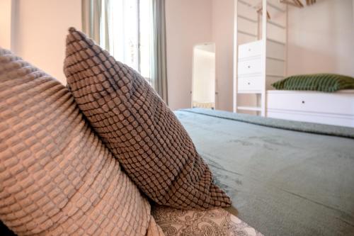 Postel nebo postele na pokoji v ubytování La Casetta