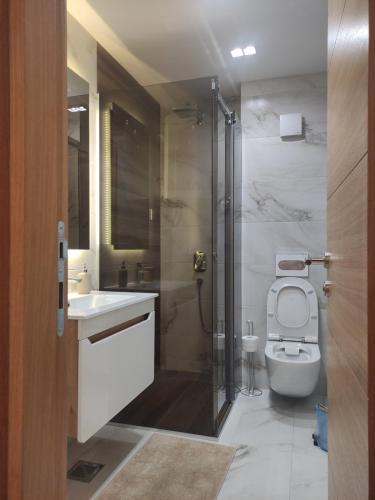 Ванная комната в Pino Silvestre II - Sir Oliver Apartman