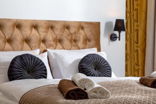 Ένα ή περισσότερα κρεβάτια σε δωμάτιο στο Amber Park Spa