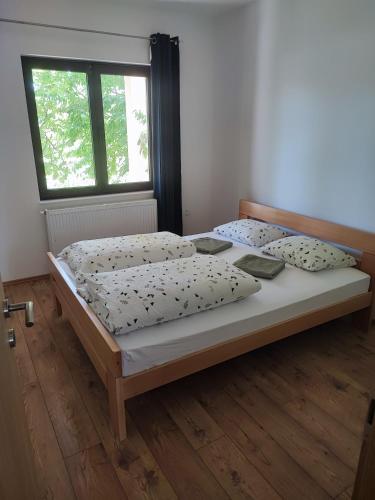Ένα ή περισσότερα κρεβάτια σε δωμάτιο στο Apartment Ivan-Experience Elite