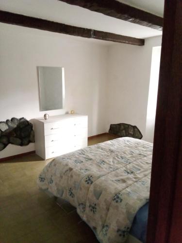 Кровать или кровати в номере Casa del Lupo