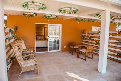 a room with a table and chairs in a room at Seixomil - Casa de Campo Boutique Design in Celorico de Basto
