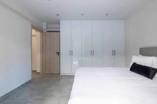 Katil atau katil-katil dalam bilik di Greyt Apartments Glyfada