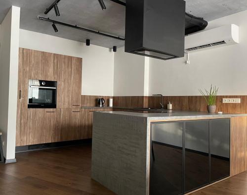 A kitchen or kitchenette at Carlo Apartments