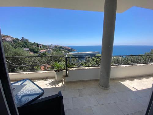 a balcony with a view of the ocean at Guesthouse HHL - Liman ll in Ulcinj