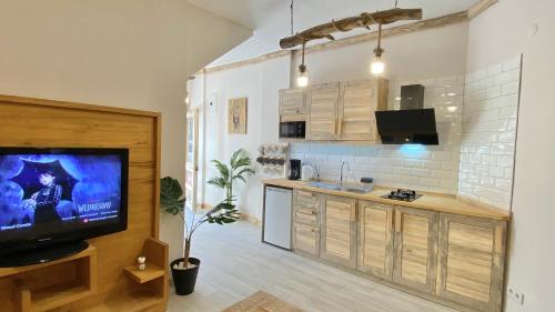 TV a/nebo společenská místnost v ubytování Cozy Design Flat in the heart of Antalya