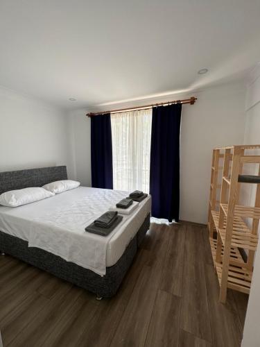 Кровать или кровати в номере byTalih