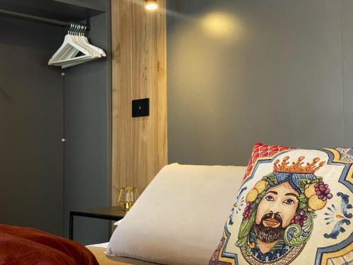 Postel nebo postele na pokoji v ubytování Murmuria Taormina