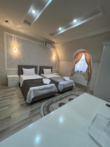 Letto o letti in una camera di Diplomat Premium