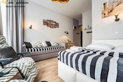 Katil atau katil-katil dalam bilik di Baltic Apartments - Willa Carmen