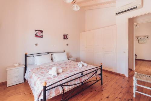 Cama ou camas em um quarto em Valentino Corfu