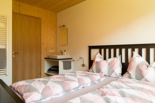 Postel nebo postele na pokoji v ubytování Bergreich Appartement 3