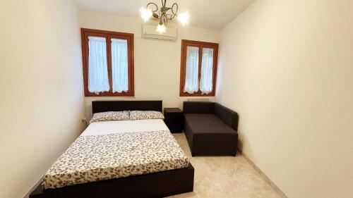 Ένα ή περισσότερα κρεβάτια σε δωμάτιο στο CASA EMMA