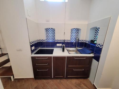 Η κουζίνα ή μικρή κουζίνα στο L & F Apartment's