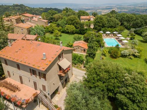 an aerial view of a house with a swimming pool at Apartment Bandiera by Interhome in Cinigiano